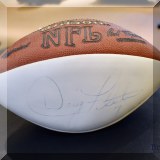 C03. Doug Flutie signed football. 
